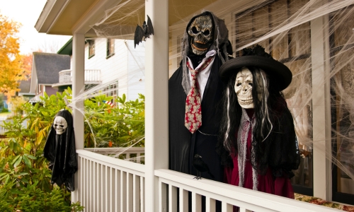 Haunted Halloween mannequins on front porch of house